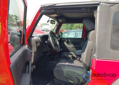 2011 Jeep Wrangler Sport z USA, uszkodzony, nr VIN 1J4AA2D10BL503264